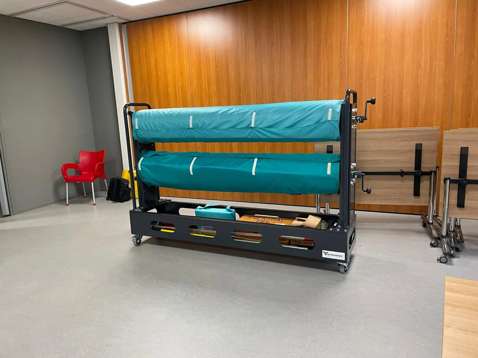 Completed RCR mobile twin-roll koersbal mat storage trolley